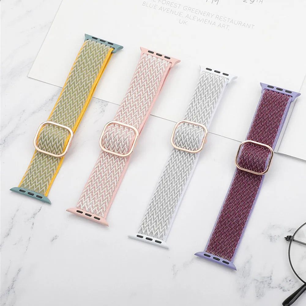 Braided nylon Apple Watch strap with wave pattern texture showing adjustable elastic design
