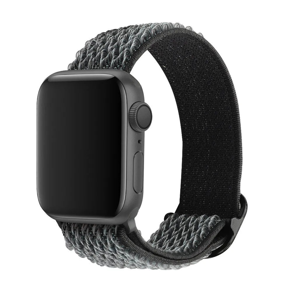 Braided nylon Apple Watch strap with wave pattern texture showing adjustable elastic design