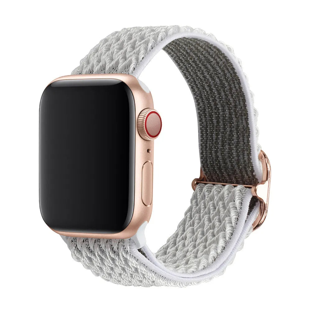 Braided nylon Apple Watch strap with wave pattern texture showing adjustable elastic design