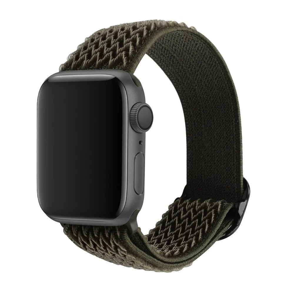 Braided nylon Apple Watch strap with wave pattern texture showing adjustable elastic design
