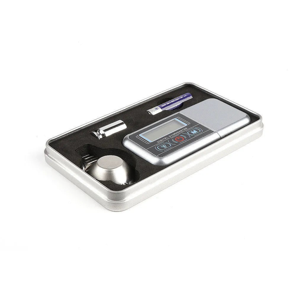 Digital electronic scale for measuring vinyl turntable stylus pressure and small items.