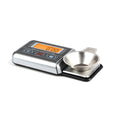 Digital electronic scale for measuring vinyl turntable stylus pressure and small items.