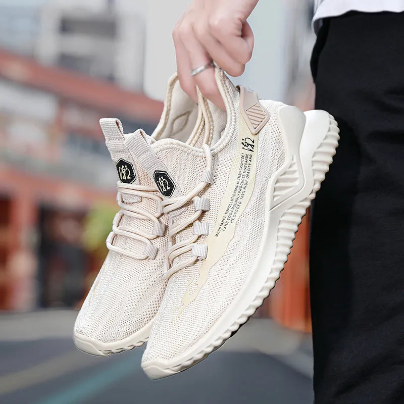 Men's low-cut white mesh sports shoes with rubber sole and lace-up front.