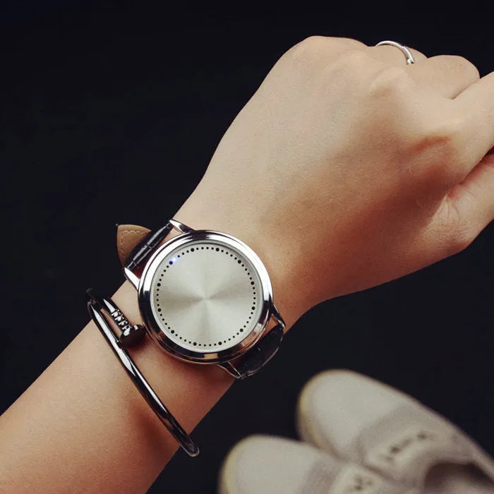 Electronic digital watch with blue light display showing casual style design