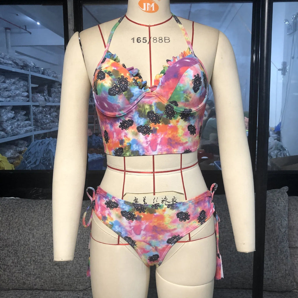 Pink gradient backless bikini swimsuit with chest pads on woman at beach