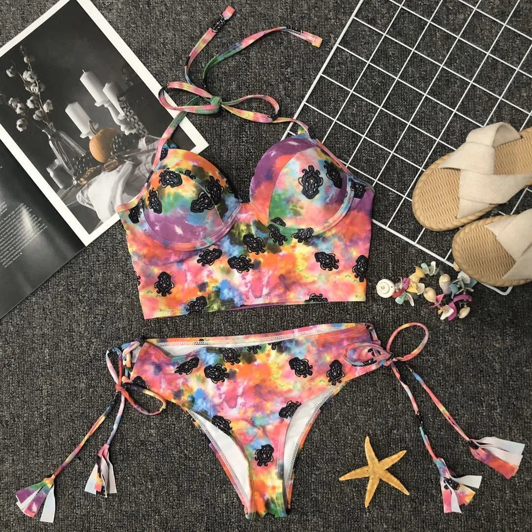 Pink gradient backless bikini swimsuit with chest pads on woman at beach