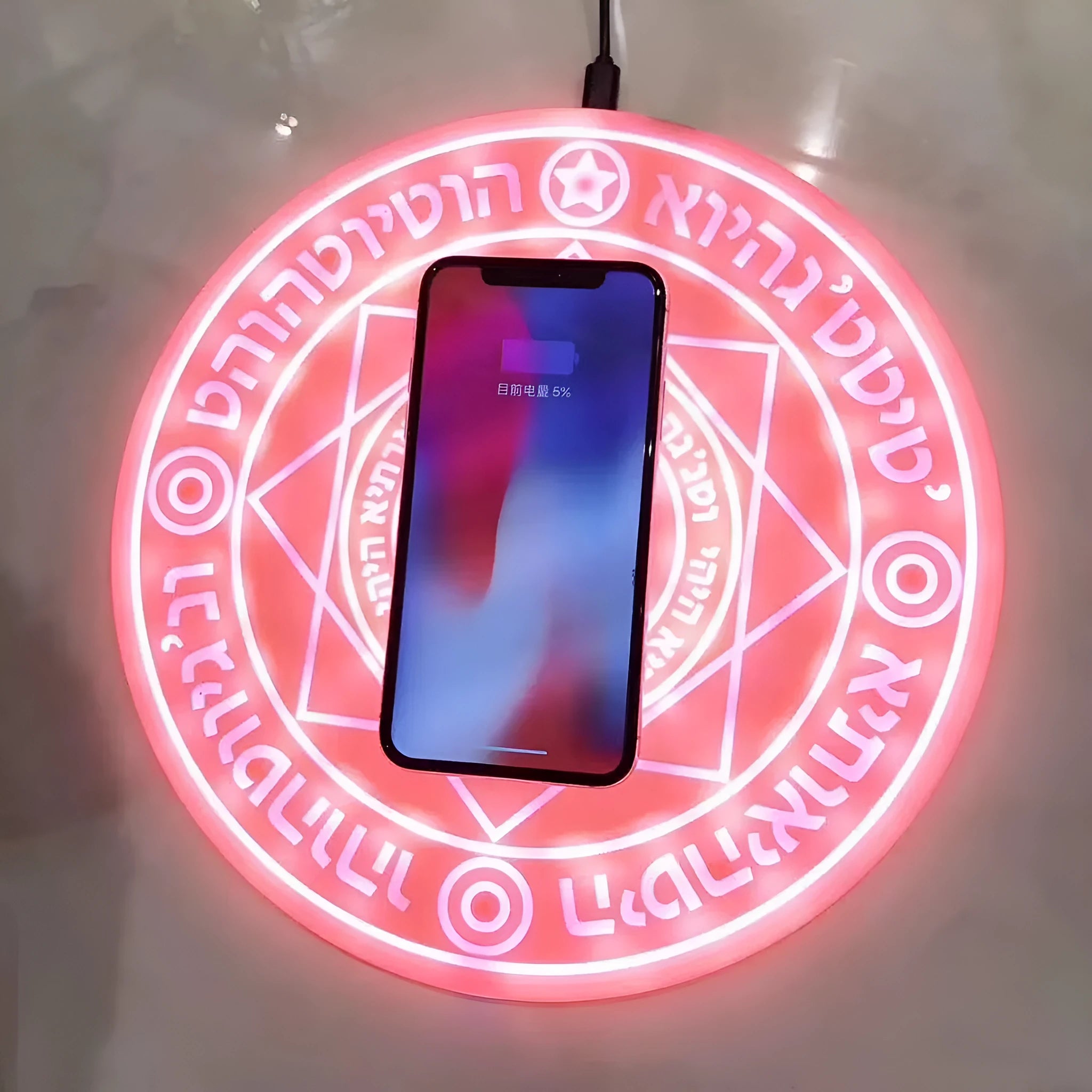 Square wireless charging pad with glowing magic array pattern design for smartphones