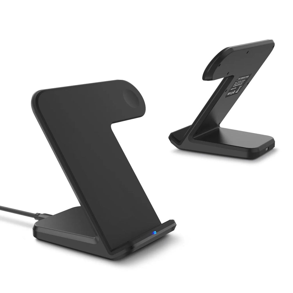 Black wireless phone charger on a desk next to a mobile phone, with a white Type-C cable.