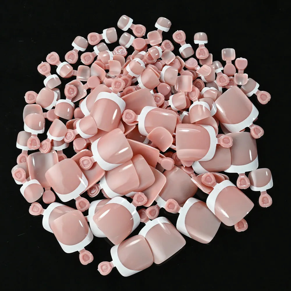 120-piece box of French white tip full square short nude nail appliqués in nine colour shades.