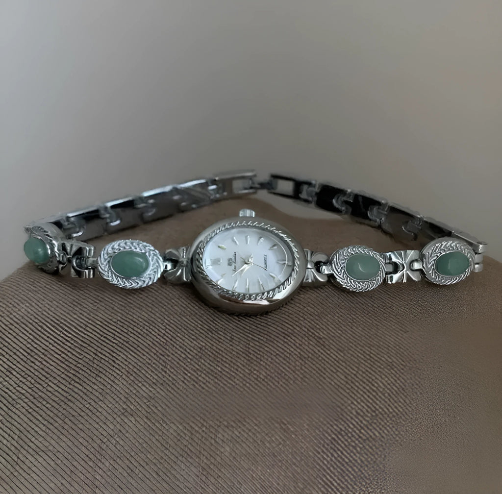 Green jade ladies quartz watch with silver case and white face
