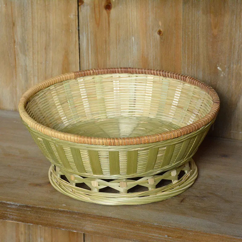 Handmade woven bamboo storage basket in natural colour showing three size variations