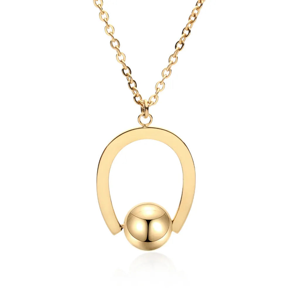 Adjustable stainless steel necklace with geometric pendant on a cross chain in gold finish.