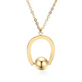 Adjustable stainless steel necklace with geometric pendant on a cross chain in gold finish.