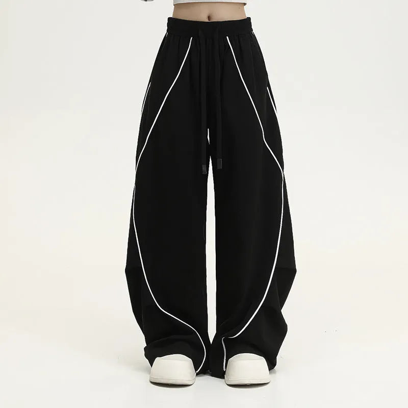 Black pleated wide-leg hip hop trousers with stripe pattern and mid waist cut