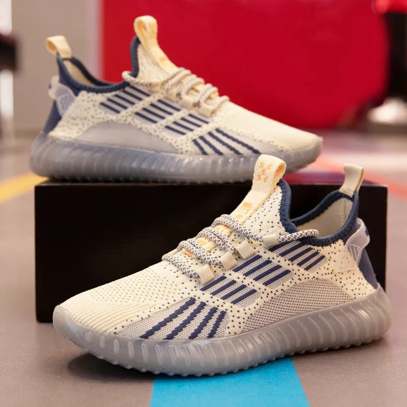 Men's white low-cut breathable sports shoes with a round toe and flat platform heel on a plain background.