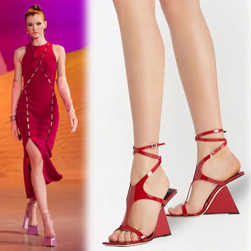 Women's black high heel sandals with a square toe and button fastening on a 9.5cm heel.