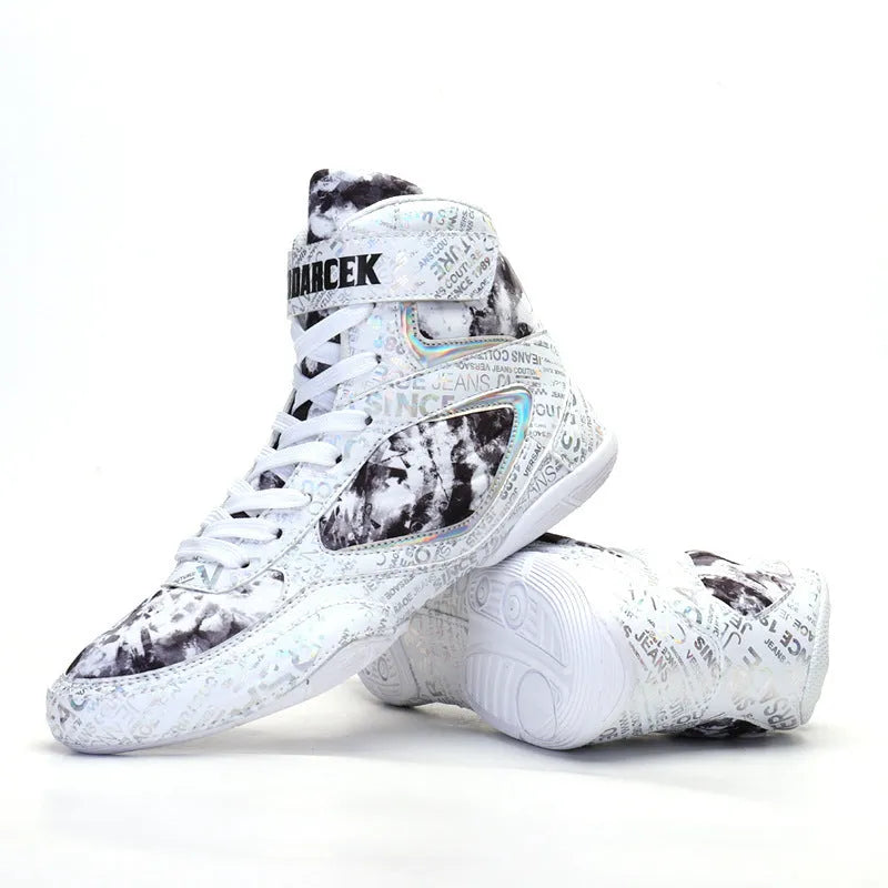 Men's high-top boxing shoes with graffiti style, black colour, front lace-up closure, mesh upper, and rubber outsole on a flat surface.