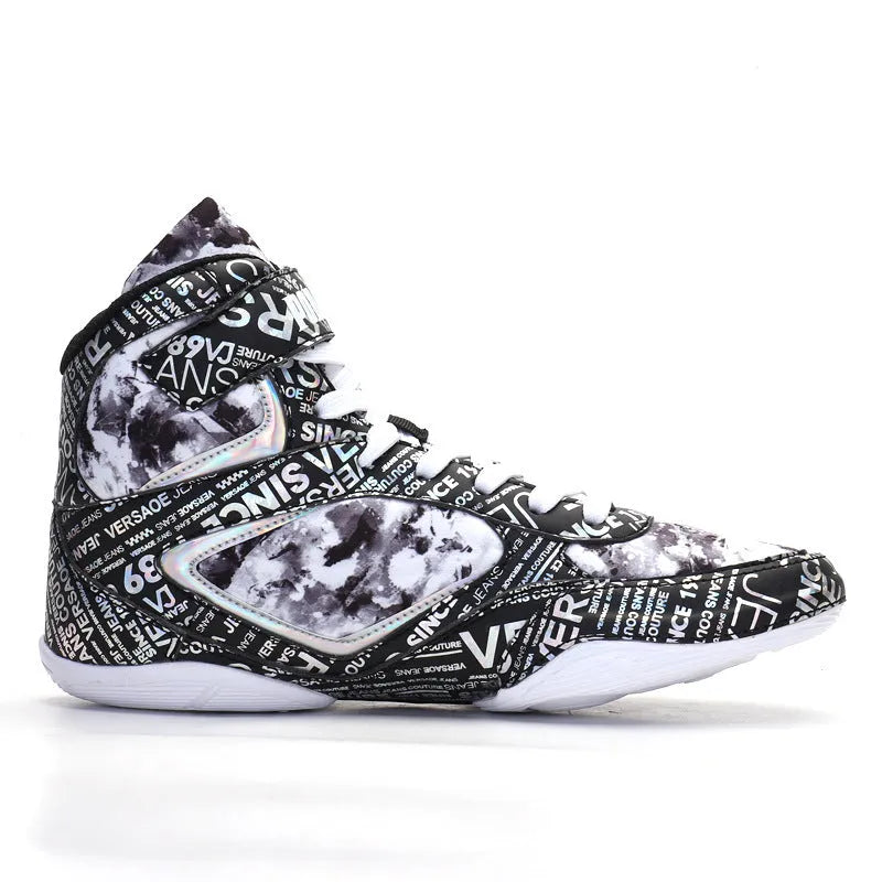 Men's high-top boxing shoes with graffiti style, black colour, front lace-up closure, mesh upper, and rubber outsole on a flat surface.