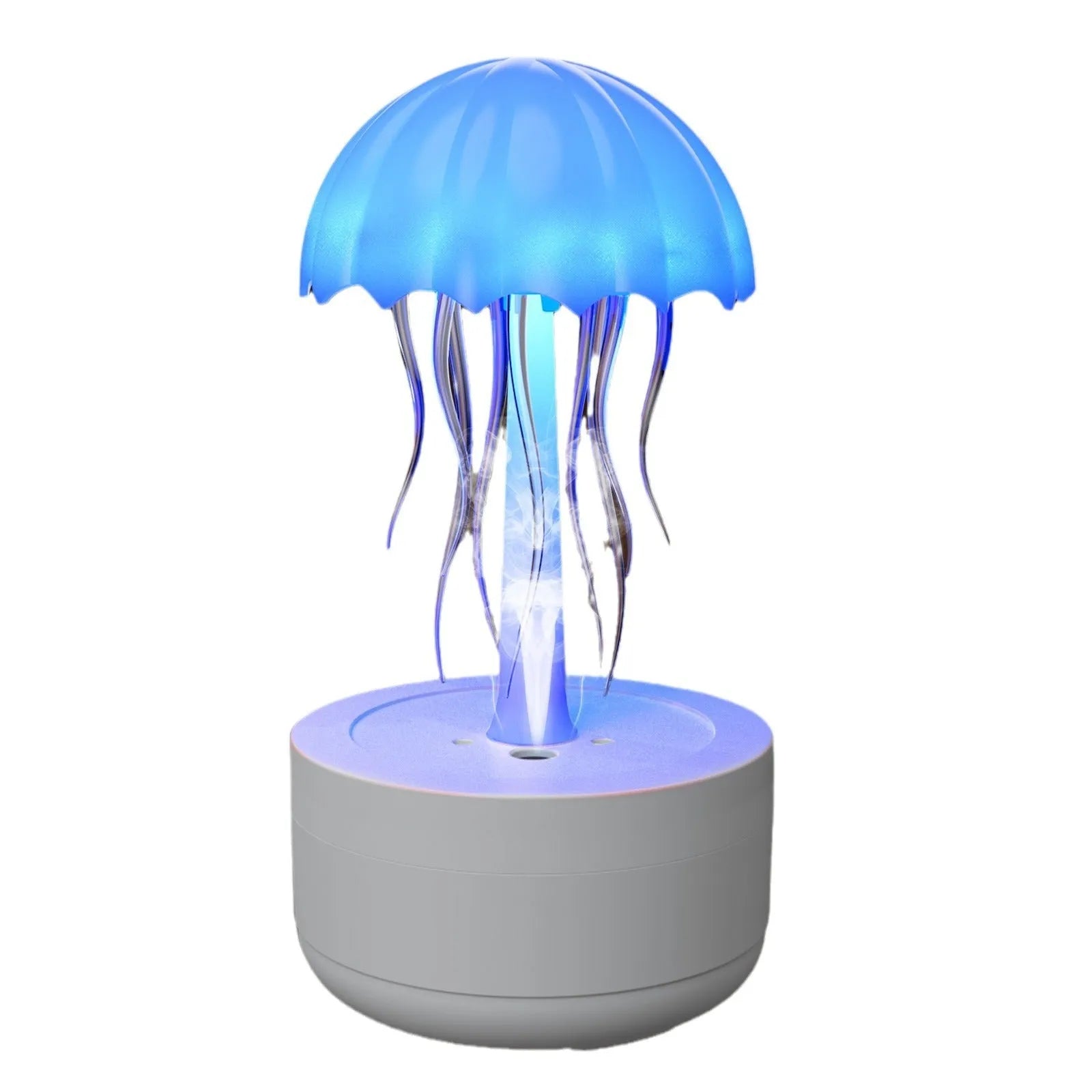 White jellyfish-shaped humidifier and essential oil diffuser with colourful LED night light on desktop