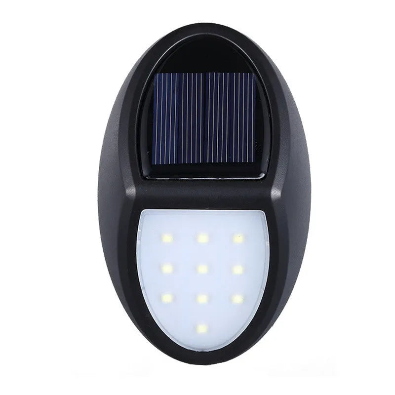 Black rectangular solar wall light with solar panel and LED illumination