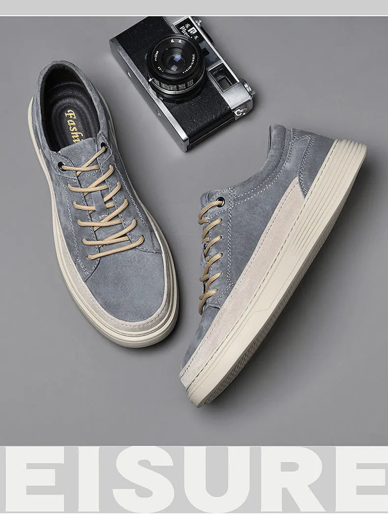 Men's grey casual skate shoes with pigskin leather upper and rubber sole, front lace-up closure