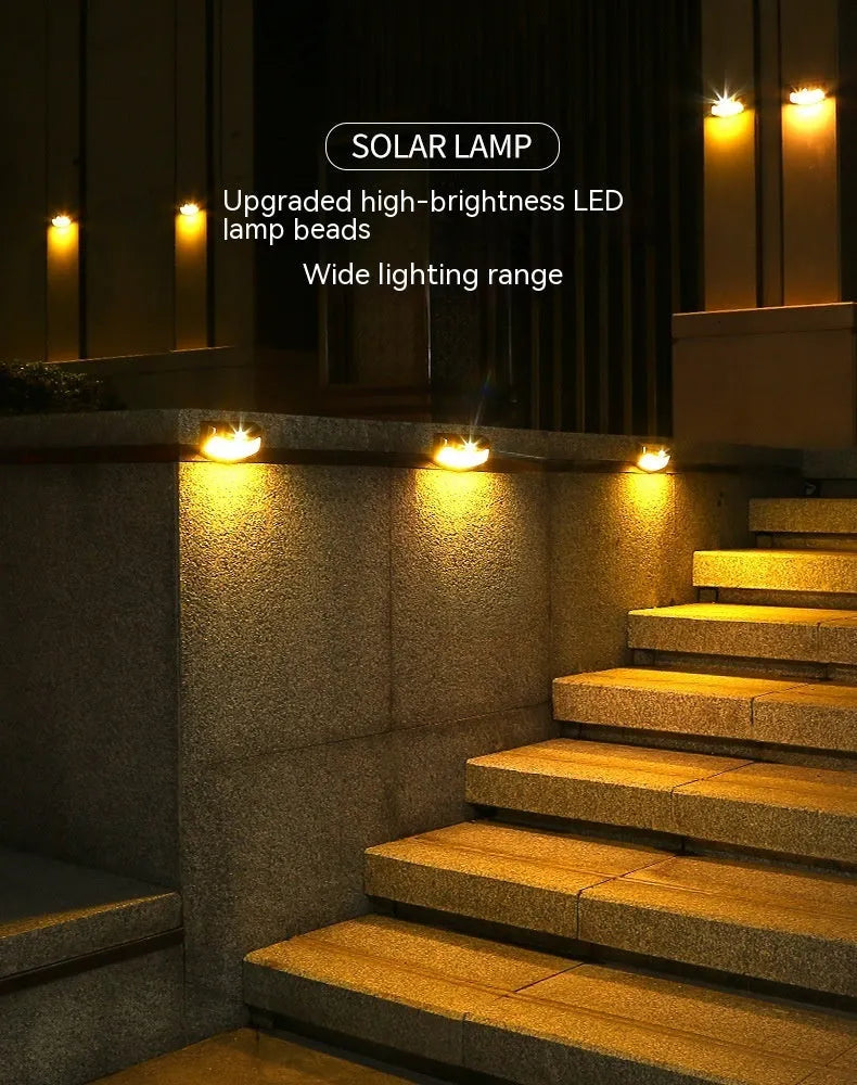 Solar garden wall light with smiley face design for outdoor courtyard illumination