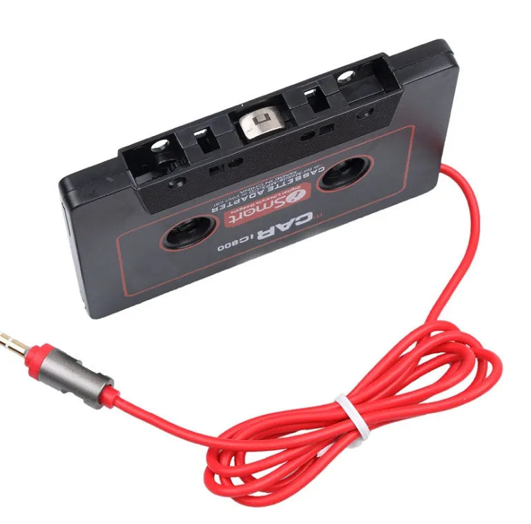 Black cassette tape adapter with a 3.5mm audio jack for connecting MP3 players to car stereos.