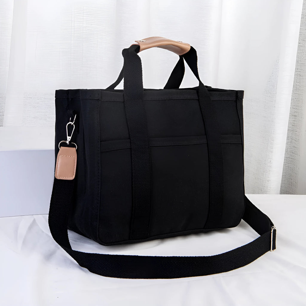 Canvas single shoulder crossbody bag in black, vertical square shape, 36x18x28cm, with zipper and buckle closure