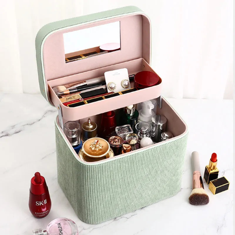 Corduroy cosmetic storage box in a solid colour with a lined interior.