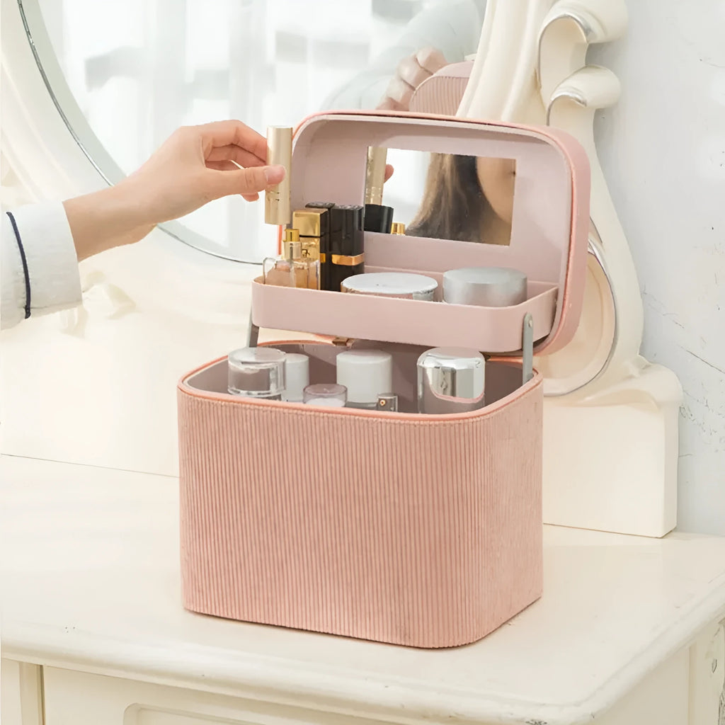 Corduroy cosmetic storage box in a solid colour with a lined interior.