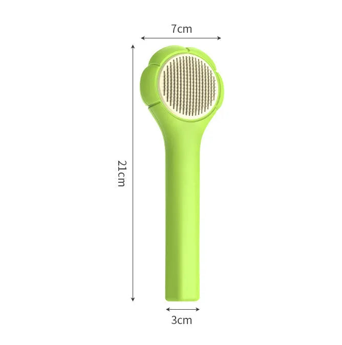Floating needle comb for cats and dogs in green colour with ABS handle and steel teeth