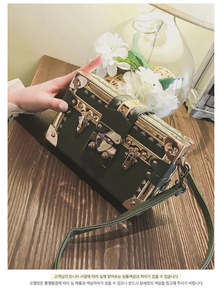 Hard-shell women's shoulder bag in PU leather with flap closure and adjustable single strap