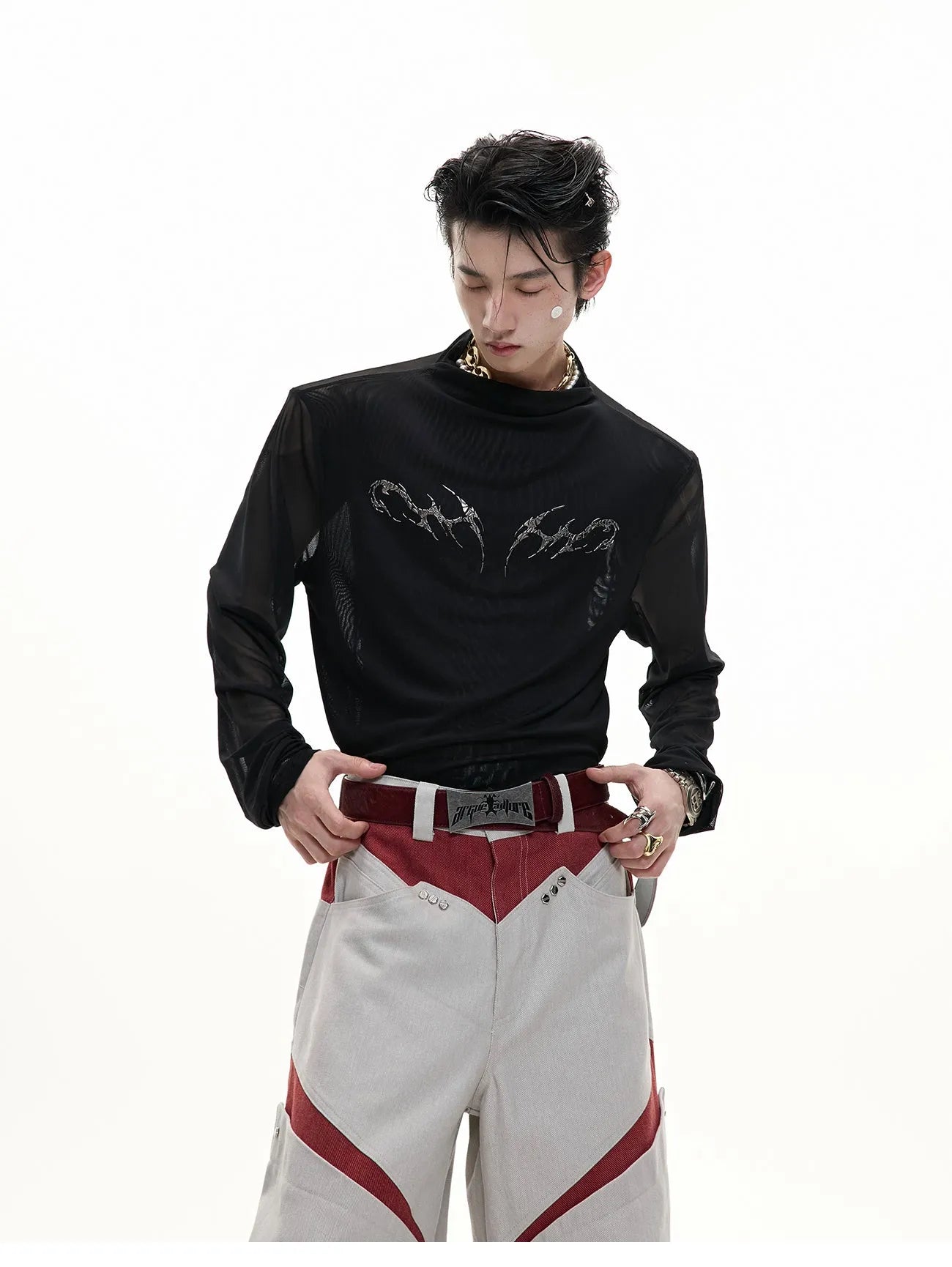 Slim fit long sleeve mesh shirt in black on a hanger, showing its lightweight texture and modern cut.