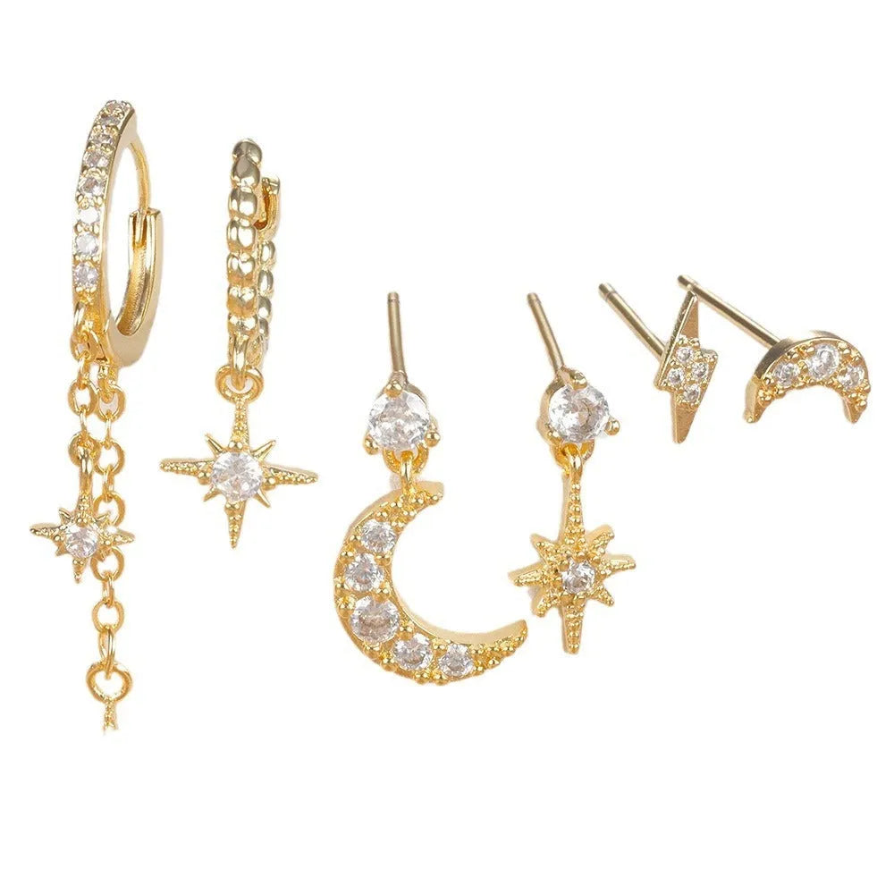 Gold colour XINGX chain tassel earrings set with six pieces showing zircon stud details