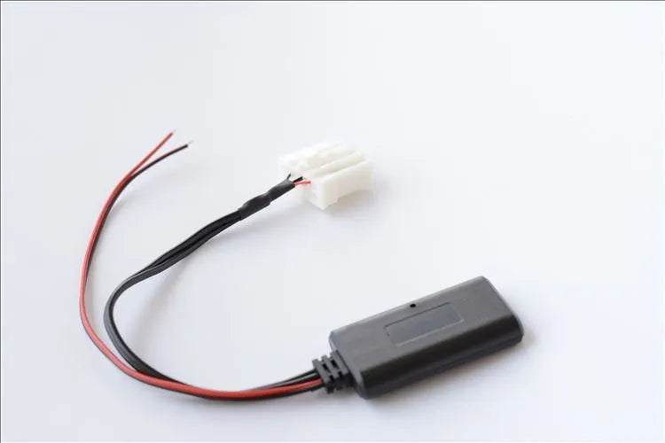 Black JieRui-BT 5908 Bluetooth audio adapter cable for Mazda vehicles with MEDIA key.