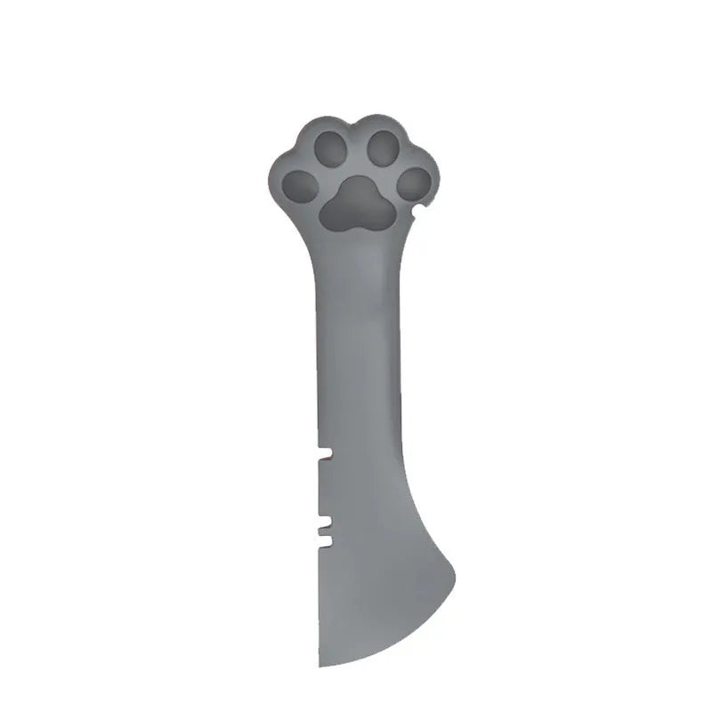 Multifunction silicone pet food spoon and can opener with pink lid, 5.1 inches long, paw-shaped scoop, white background