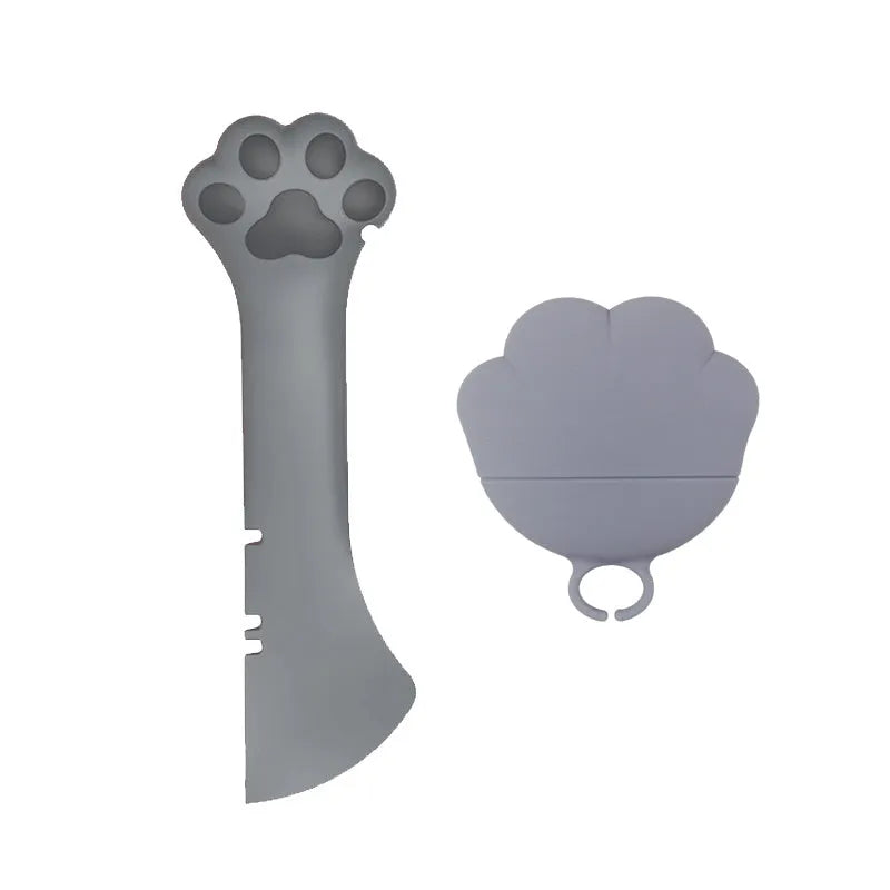 Multifunction silicone pet food spoon and can opener with pink lid, 5.1 inches long, paw-shaped scoop, white background