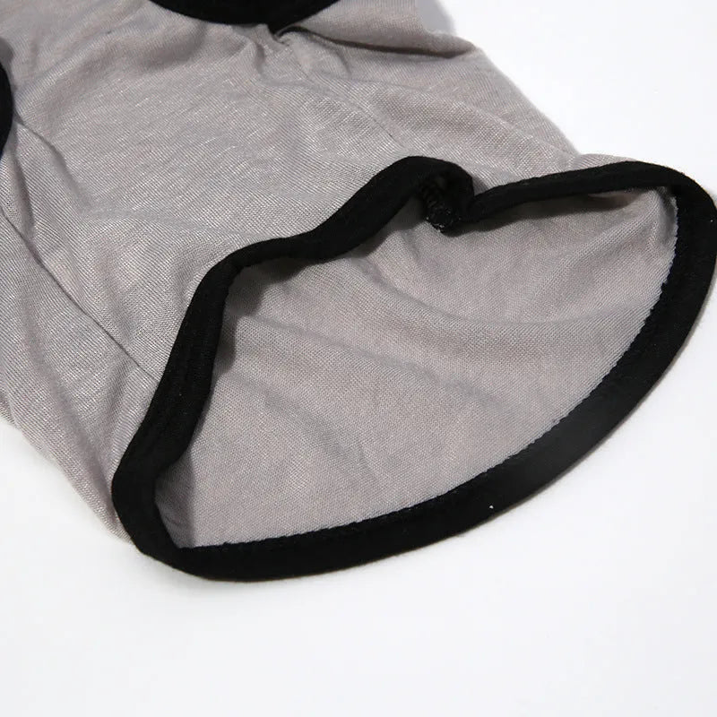 Grey dacron pet vest for dogs and cats, casual style, shown on a small pet with five size options from XS to XL
