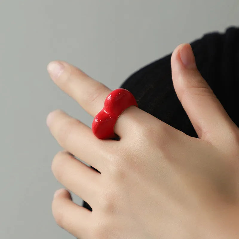 Heart-shaped zinc alloy ring with raised three-dimensional enamel colour design in love theme.