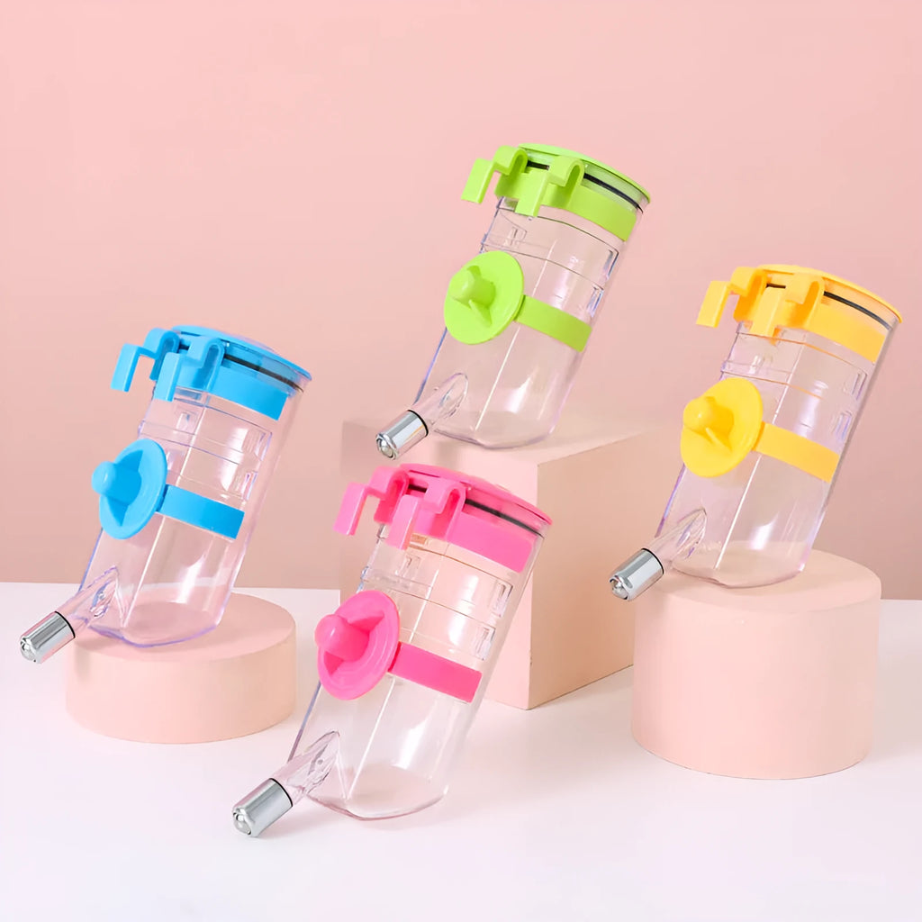 No drip dog kennel water bottle dispenser with dripless nozzle, hanging in a crate, available in blue, green, pink, and yellow