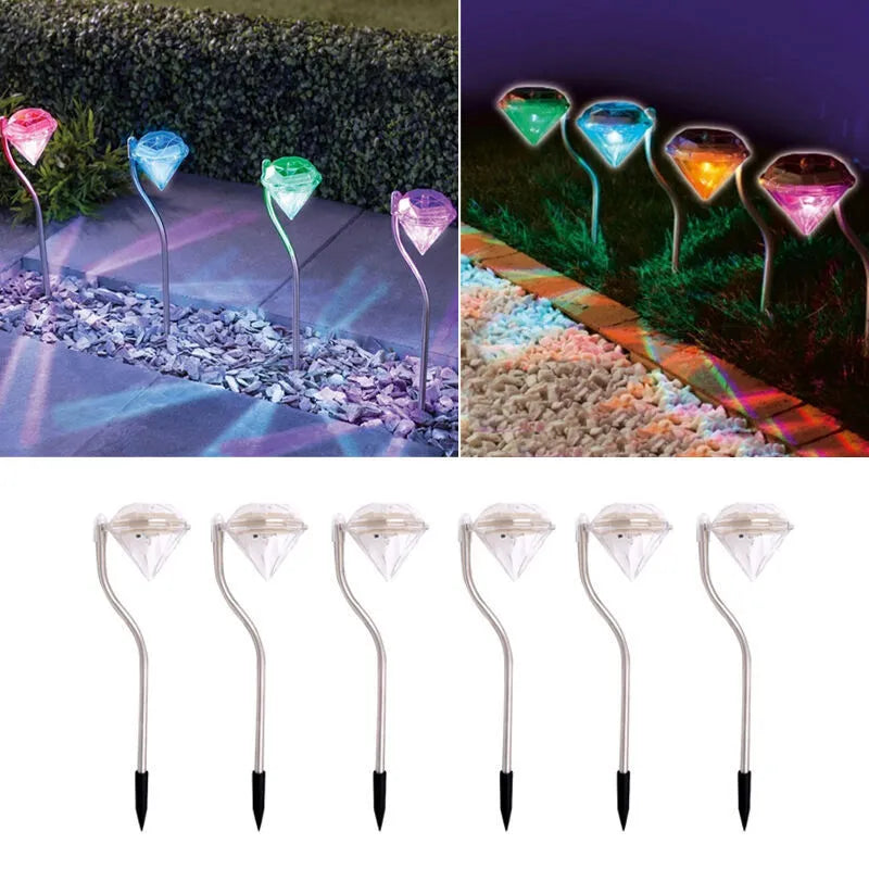 Solar powered garden diamond light with adjustable angle and solar panel on adjustable mount.