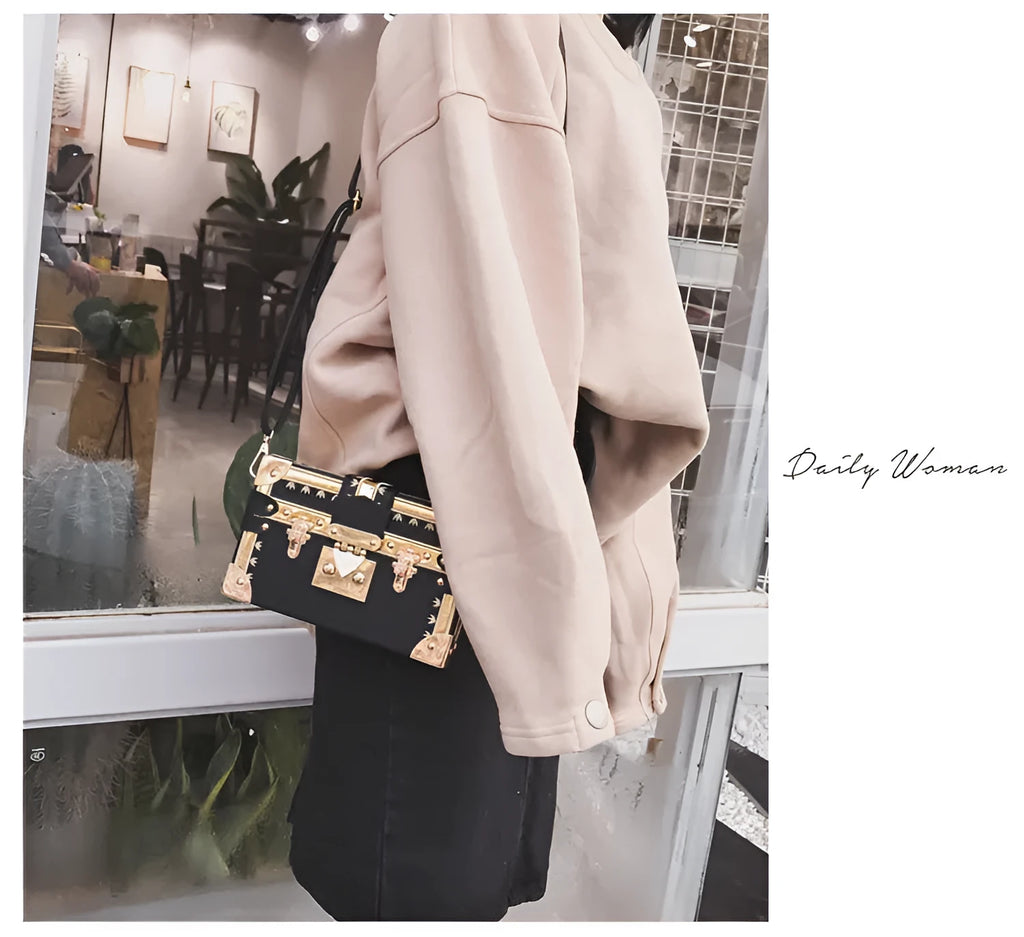 Hard-shell women's shoulder bag in PU leather with flap closure and adjustable single strap