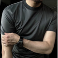 Ice silk soft breathable round neck short sleeve T-shirt in black front view on model