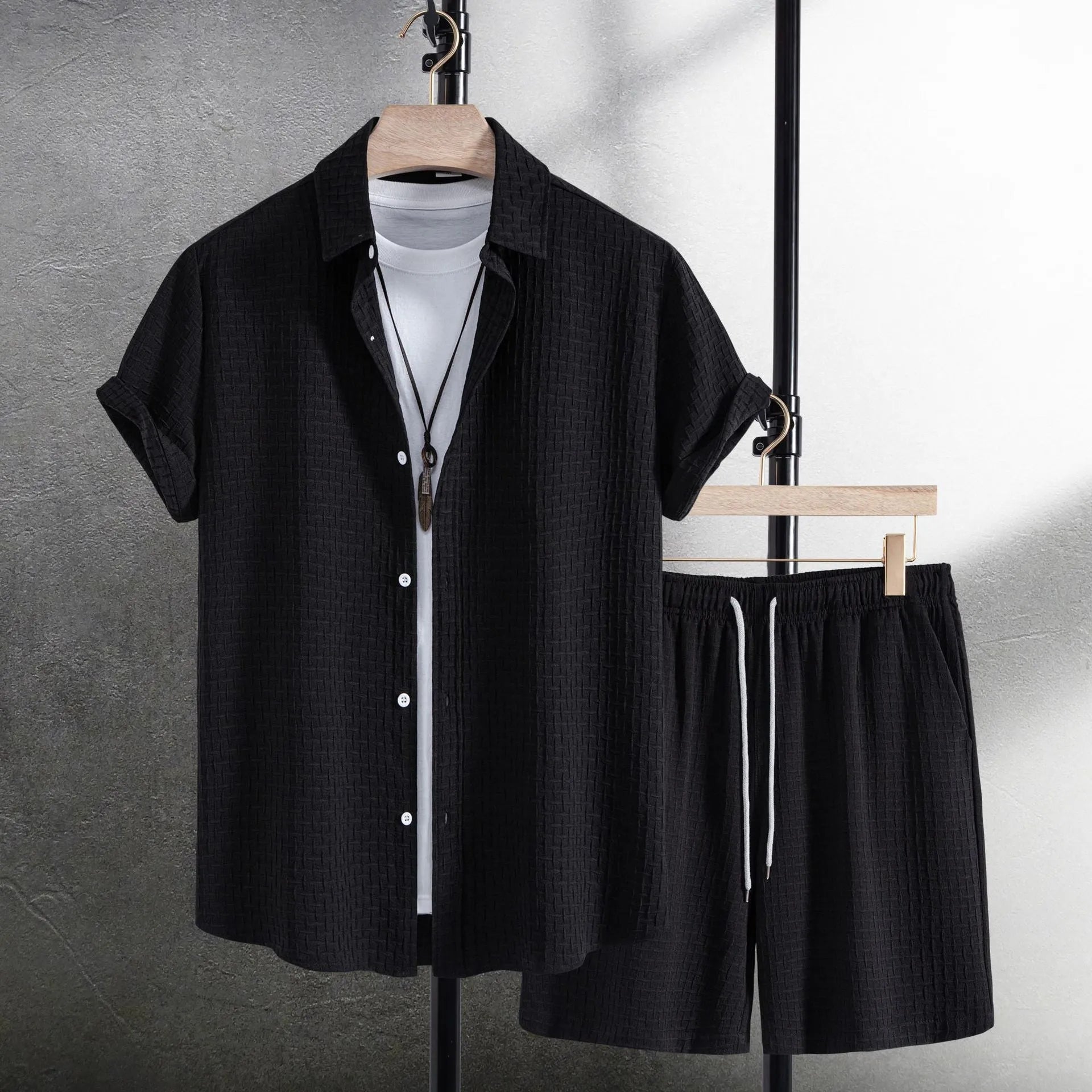 Men's black cotton blend shirt and shorts casual set laid flat