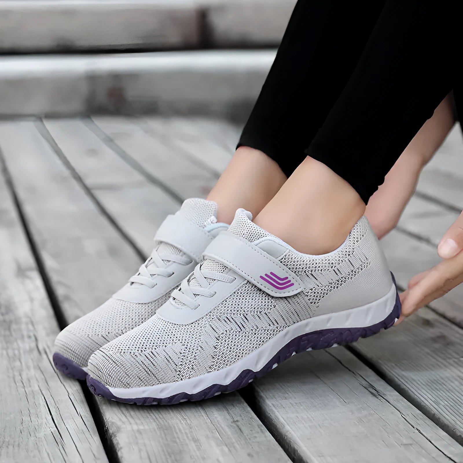 Women's grey purple low-top wedge heel shoes with mesh upper and Velcro strap fastening.