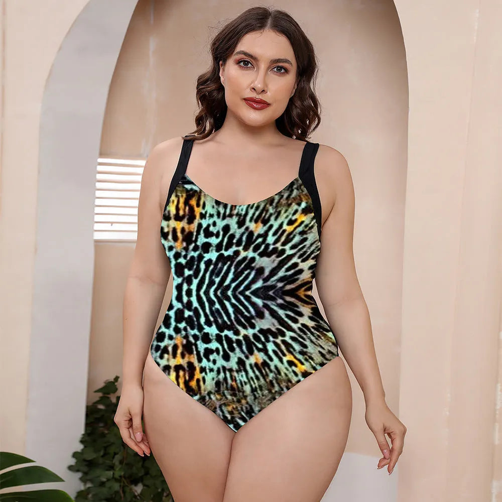 Conservative vest-style one-piece swimsuit with spaghetti straps and a floral print pattern.