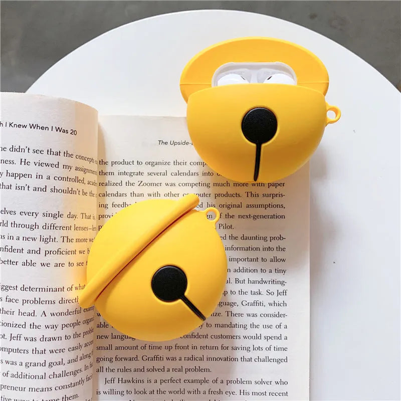 Yellow bell-shaped silicone protective case for AirPods 1 and 2 generation charging cases.