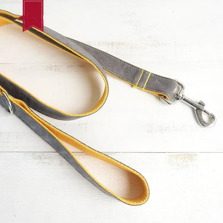 Grey and yellow dog leash made from polyester fibre, shown on a flat surface, available in multiple sizes
