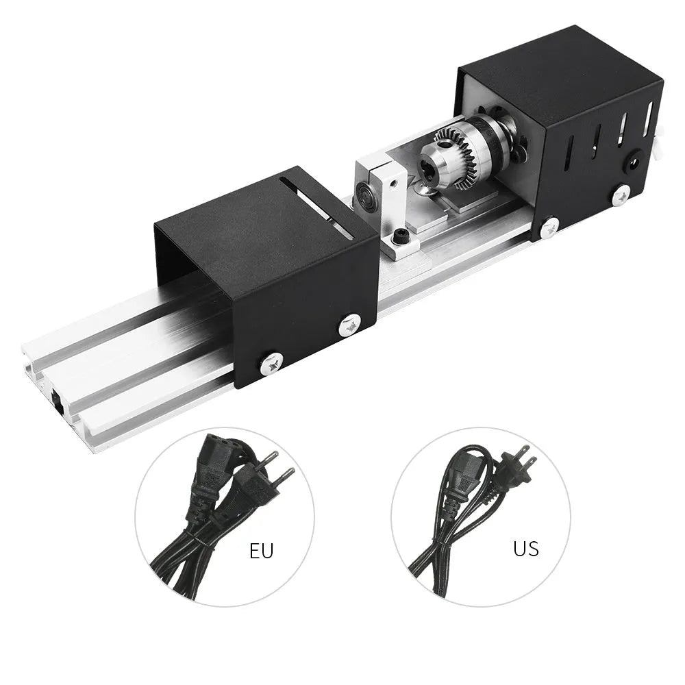 Silver mini woodworking lathe metal model with carving tools and 140mm capacity on workbench