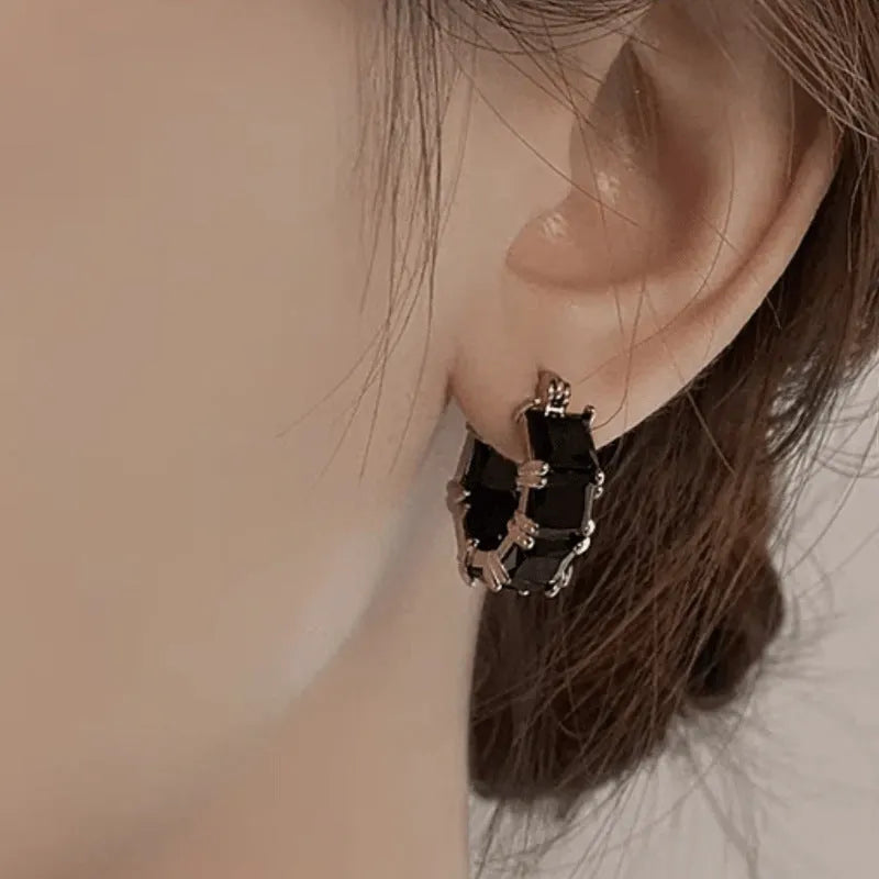 Geometric U-shaped zircon ear rings with gold plating in black, pink and white colour options